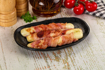 Hot mozzarella sticks with bacon