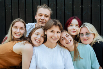 Happy diverse group of teenagers posing for a selfie