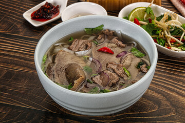 Vietnamese Pho Bo soup with beef and noodles