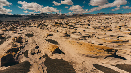 Aerial view of the surreal rock formations in the Campo de Piedra Pómez, located in the high-altitude desert of Catamarca, Argentina. 