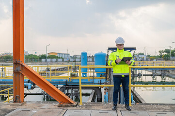 Environmental engineers work at wastewater treatment plants,Water supply engineering working at...