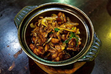 Kung Pao Frog, Taiwanese specialty dish, featuring tender frog legs stir-fried with peanuts, dried...