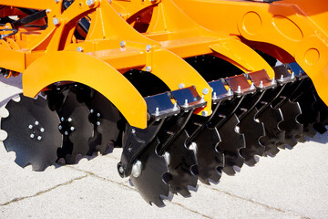 Trailed in-line disc harrow at agricultural exhibition
