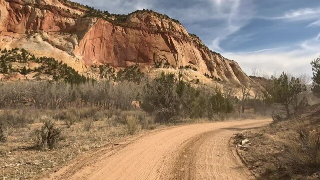 Driving river crossing desert trail Utah POV. Coral Pink Sand Dunes , Recreation Area. Adventure off road riding and exploring. U.S. Bureau of Land Management,State Park, day camping destination.