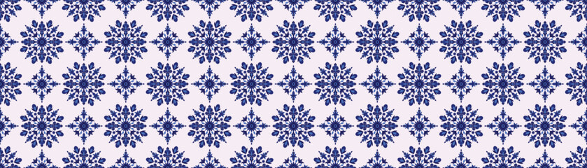 Seamless blue floral pattern in folk style. Winter seamless pattern with snowflakes. Blue ornamental snowflake and flower seamless design. Tileable winter pattern with folk floral snowflakes