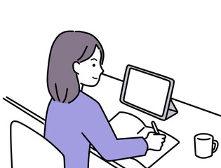 カフェでタブレットPCで動画を観ながら勉強する女性