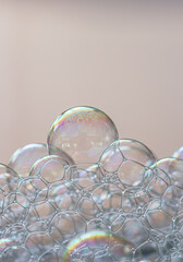 Fototapeta premium A captivating view of iridescent soap bubbles, revealing intricate details and a dreamy quality.