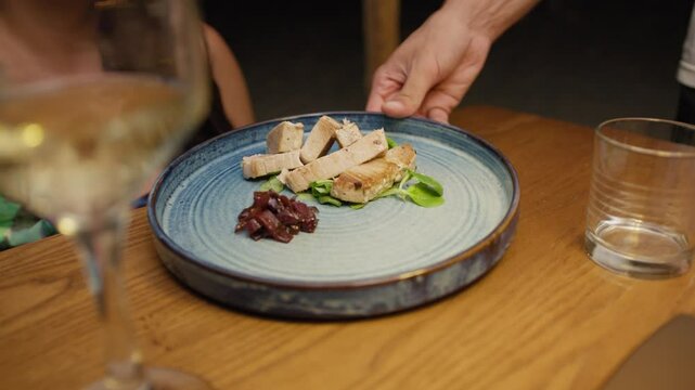 Waiter Serving The Tuna Dish For The Perfect Gourmet Dinner At The Restaurant 