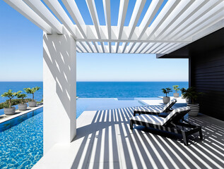 Obraz premium two lounge chairs on a patio overlooking an infinity pool and ocean