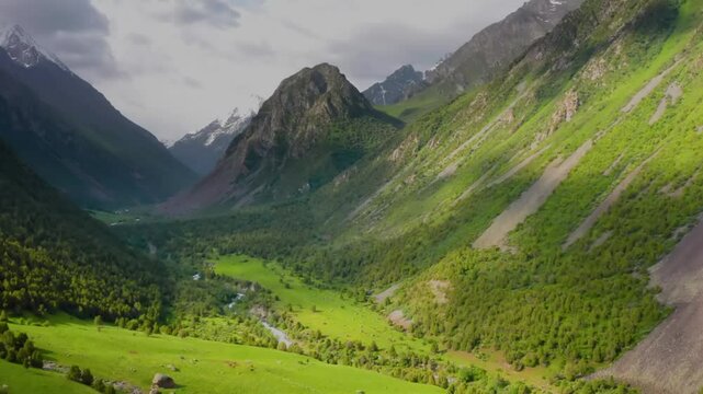 4K drone footage shows the beautiful green landscapes of Ala Archa National Park in Kyrgyzstan, capturing its lush beauty and surrounding mountains.