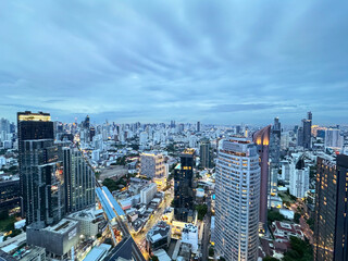 Aerial view of Bangkok skyline, Bangkok financial district, buildings and skyscrapers under sunset...