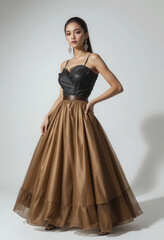 Minimalist Fashion Portrait with Bubble Skirt in Neutral Studio Setting.