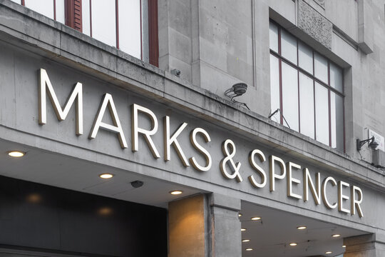 Marks and Spencer neon sign on a store in Oxford Street, London