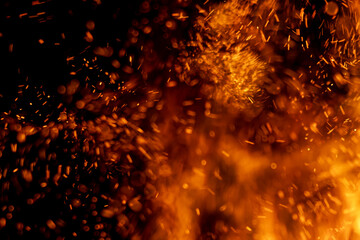A black background with orange sparks
