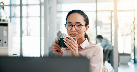 Office, businesswoman and coffee with laptop for reading, online research and accountant with...