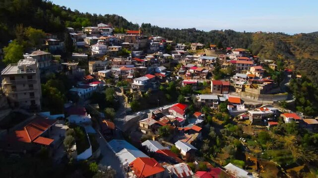 Landscape of Cypriot mountain village in Nicosia. Cyprus. 
View from above over evening landscape. Countryside and measured life.