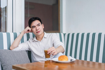 Relaxing afternoon with coffee and pastry in a cozy cafe setting