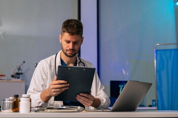 Medicine doctor hand working with modern digital tablet and laptop computer interface as medical network concept.