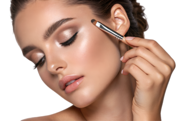 Beautiful woman holding eyeshadow ready to apply on her face on transparent background	