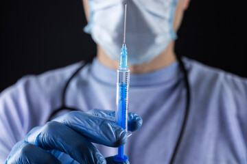 Doctor, or scientist hand in blue nitrile gloves holding flu,