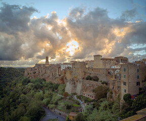 Fototapeta premium Italian hilltop town of Pitigliano under a cloudy sky