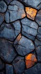 Textured Stone Phone Wallpaper   Dark Irregular Stones with Warm Orange Highlights on Rustic Background | Earthy Mobile Background in 4K HD

