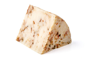 Seasoned cheese wedge with herbs and spices, isolated on white background.