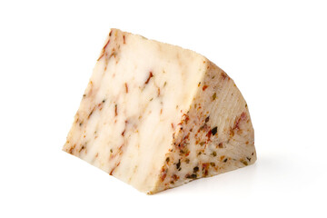 Seasoned cheese wedge with herbs and spices, isolated on white background.