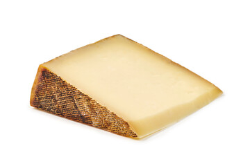 Wedge of aged Manchego cheese, isolated on white background.
