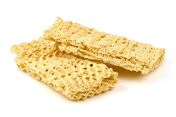 Dried instant noodle blocks isolated on white background.