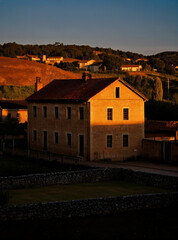Rural yellow house in the dusk