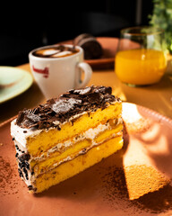 Cozy Breakfast with Muffins, Toast, Orange Juice, and Cappuccino – Morning Food Scene with Warm Natural Light and Homemade Pastries on a Rustic Table