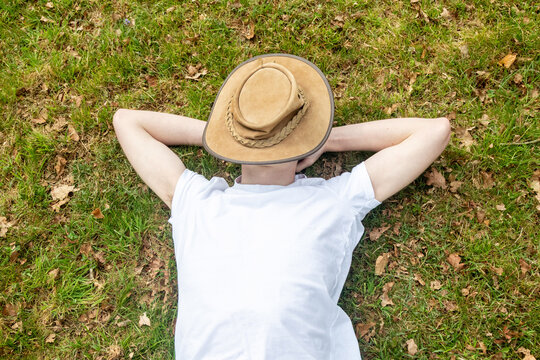 Teenage Boy Napping On Grass