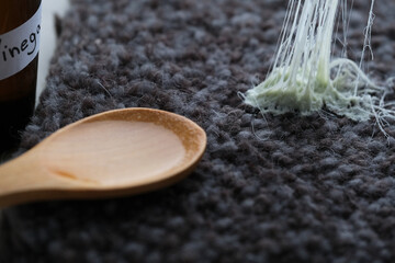 An alternative method removing chewing gum from textured surface using vinegar solution. Concept of...