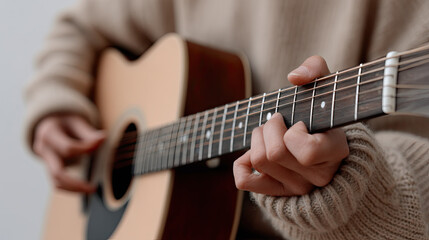 Fototapeta premium Playing guitar with passion and focus