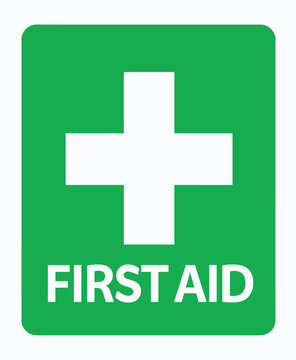 Green First Aid Sign with White Cross and Text