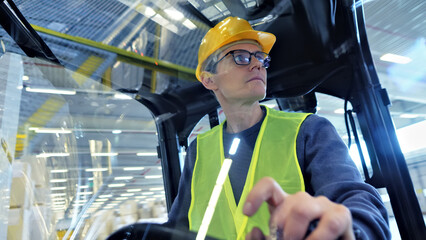 A female forklift driver in a neon vest and hard hat navigates the factory floor, symbolizing precision and safety in global logistics.