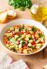 Vegetable minestrone soup. Vegetarian food. Italian cuisine.