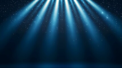 The image shows multiple beams of bright blue light emanating from the top of the frame, converging towards the bottom, against a dark blue background speckled with small white particles that resembl