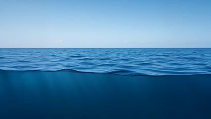 Obraz premium This photo depicts a calm sea where the surface of the water ripples gently under a clear sky, creating a harmony between the blue ocean and the celestial simplicity, while showing a cut as if the cam