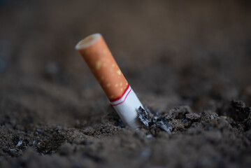 Cigarette burning from smoker addictive nicotine