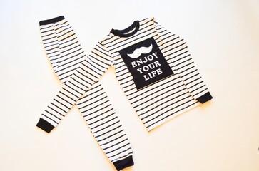 Striped black and white pajamas with motivational message design