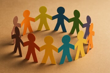 Colorful paper cut-out people are holding hands in a circle, symbolizing unity and cooperation.
Concept of: Global community.