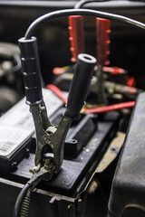 close up of a car engine battery 