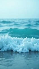 Obraz premium Tranquil ocean waves in soft focus with a misty blue atmosphere gradating to pale turquoise, ocean, gradient