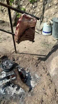 Lamb on the cross, Outdoor barbecue, Argentinian cordero a la cruz.