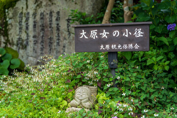 Oharame no Komichi Path Signpost and stone statue. Ohara, Kyoto, Japan