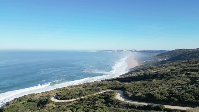 Aerial shot of Miraduro Da Salgado, offering a stunning view of the coastline near Nazar&eacute;, Portugal