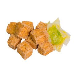 Cubes of golden fried tofu with crispy outer coating, accompanied by a small garnish, isolated on...
