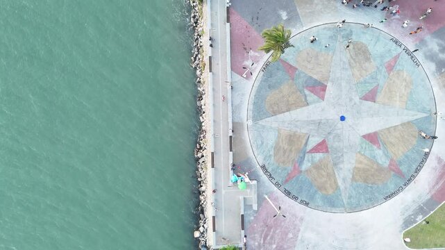 simbolo gigante e o drone se afastando trasendo uma dimers&atilde;o em cabedelo (giant symbol and the drone moving away bringing a dimension in cabedelo)